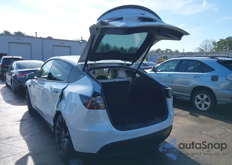 2023 Tesla Model Y Performance Dual Motor All-Wheel Drive from USA, damaged, VIN 7SAYGDEF6PF665311